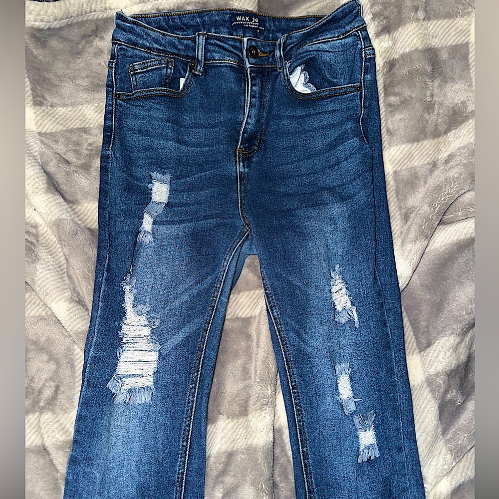 Women’s ripped blue Jeans